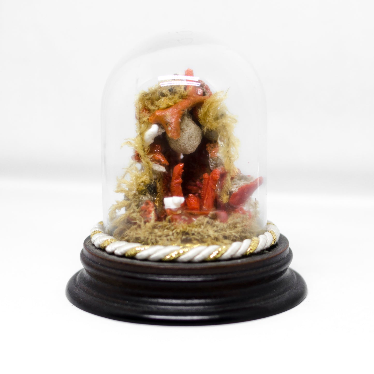 Red coral nativity scene