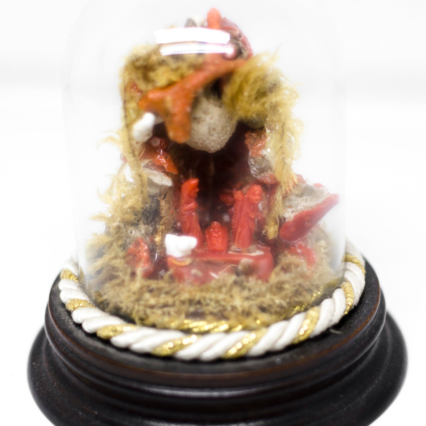 Red coral nativity scene