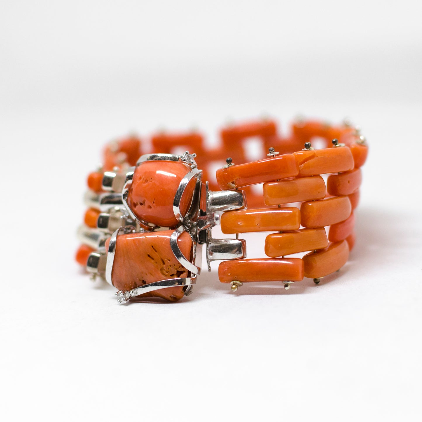 Orange coral and silver bracelet